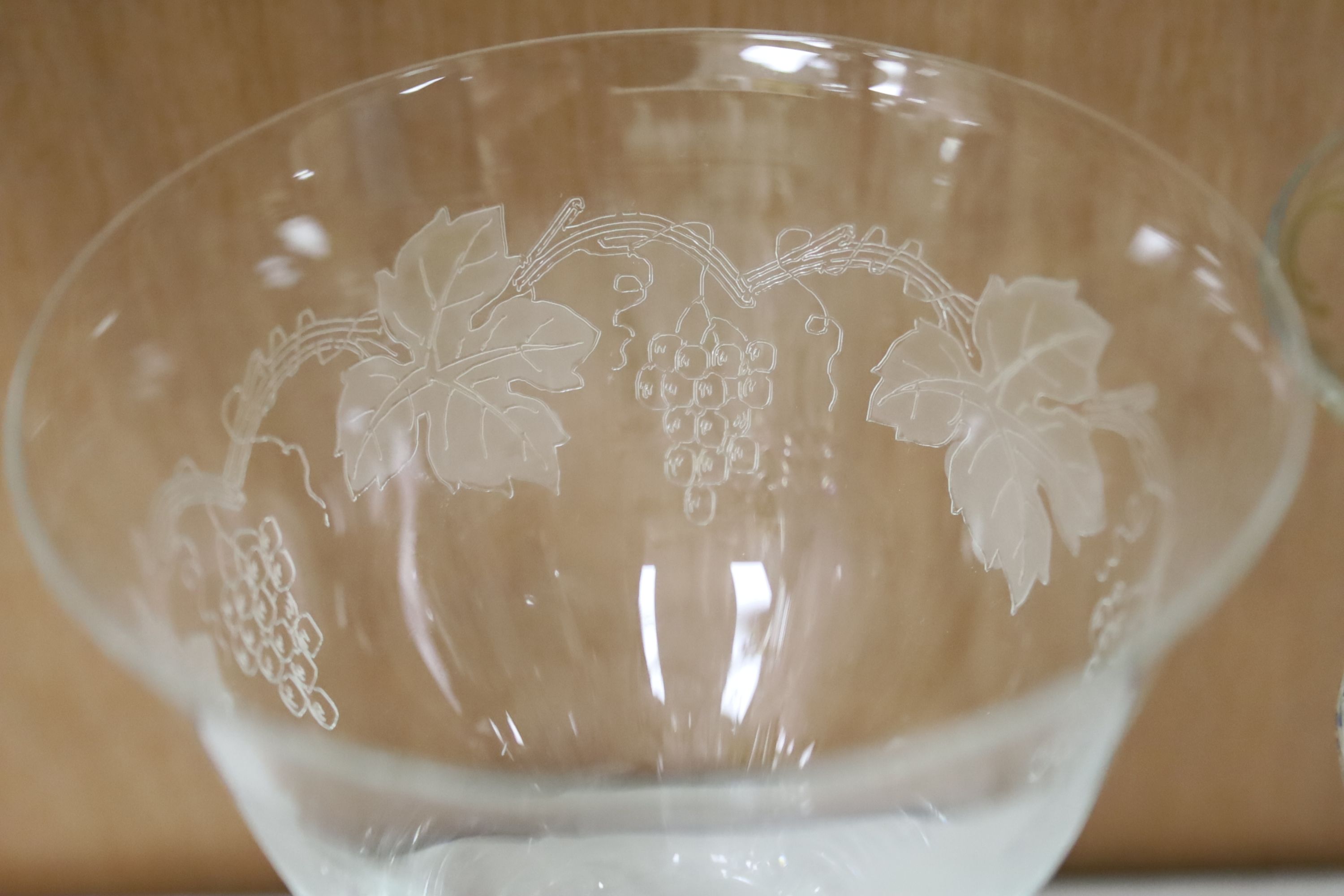 A collection of assorted mixed cut and etched glassware